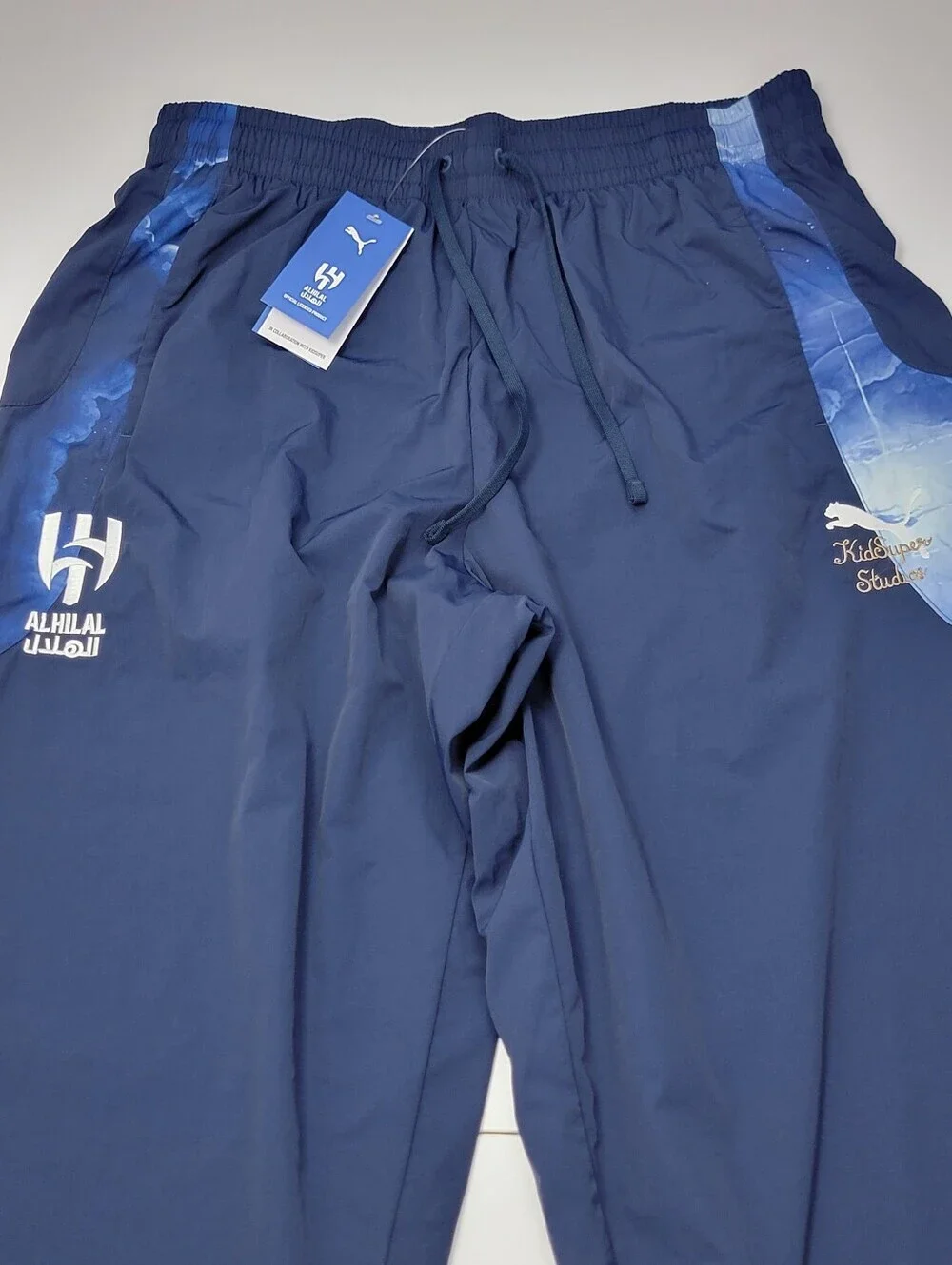 Puma KidSuper Al-Hilal SFC Travel Pants Navy Blue Cloud Print 606853 20 Mens L